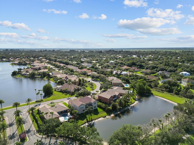 drone / aerial view with a water view