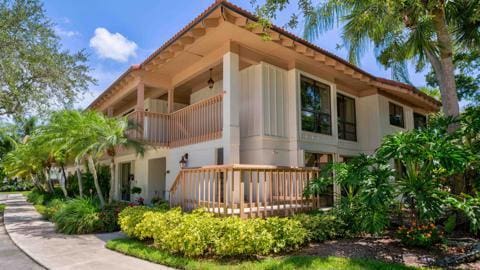 view of property exterior featuring a balcony