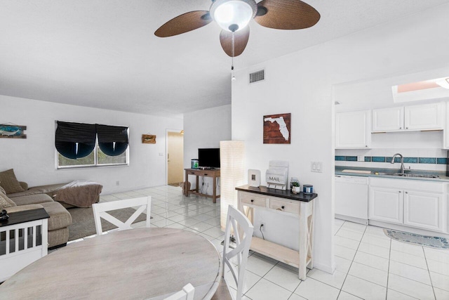 interior space featuring sink and ceiling fan