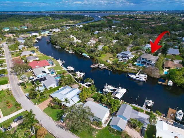 drone / aerial view featuring a water view