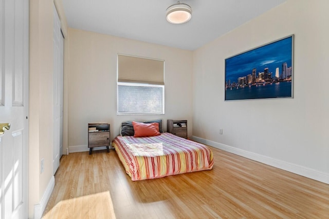 bedroom featuring hardwood / wood-style floors