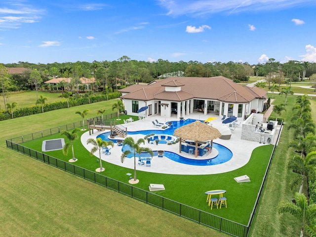 view of pool featuring a yard and a patio area