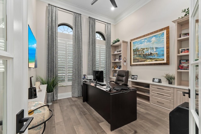 office area with hardwood / wood-style floors, ornamental molding, and ceiling fan