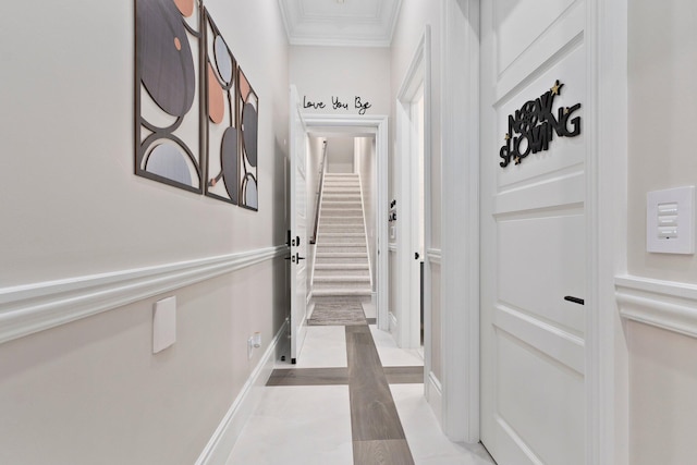 hallway featuring crown molding