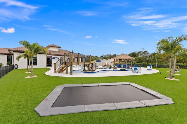 exterior space with a gazebo and a lawn