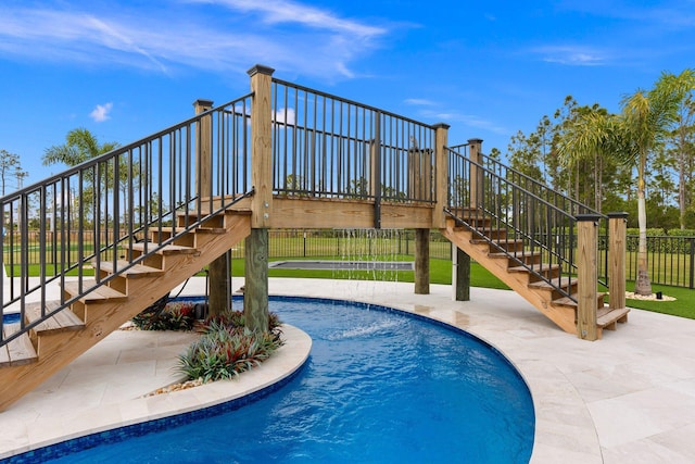 view of swimming pool featuring a patio