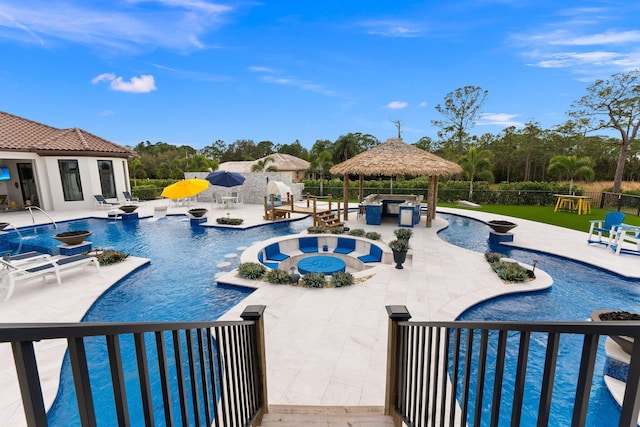 view of swimming pool with a gazebo, an in ground hot tub, and a patio