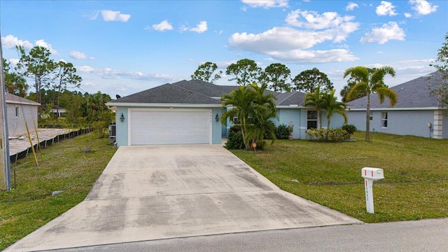 ranch-style house with a front yard and a garage