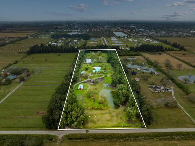 aerial view featuring a water view and a rural view