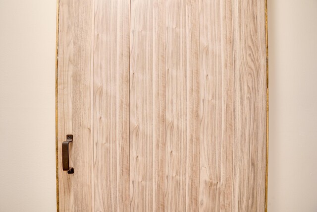 bathroom featuring vanity, tile walls, and an enclosed shower