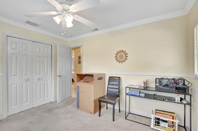 office area featuring ornamental molding, light carpet, and ceiling fan