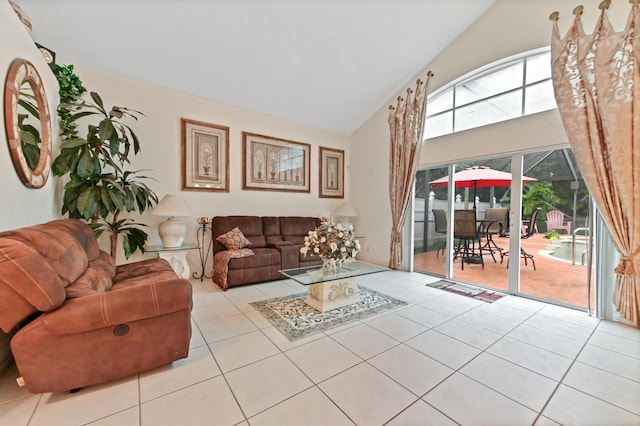 living room with light tile patterned flooring and lofted ceiling