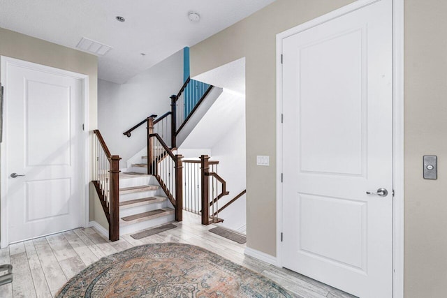 entryway with light wood-type flooring