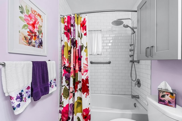 bathroom with shower / bath combo and toilet