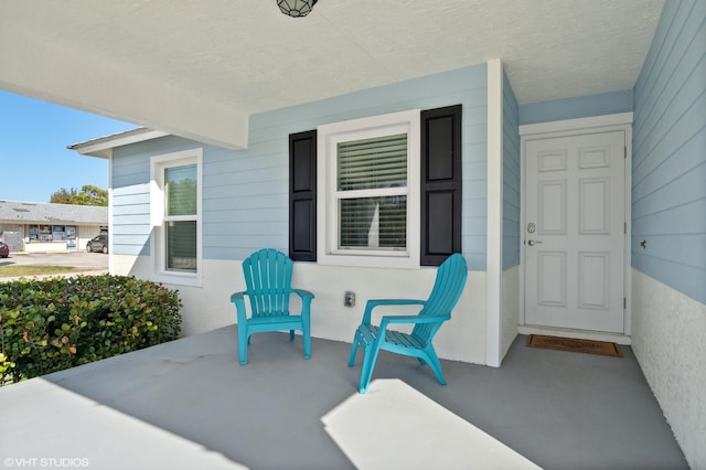 view of patio featuring a porch