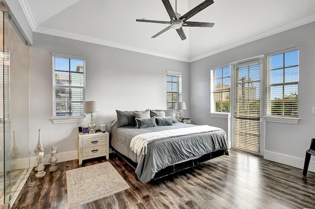 bedroom featuring dark hardwood / wood-style floors, vaulted ceiling, ceiling fan, and ornamental molding