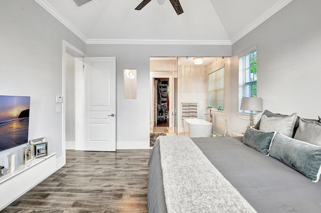 bedroom with crown molding, ceiling fan, hardwood / wood-style flooring, a closet, and lofted ceiling