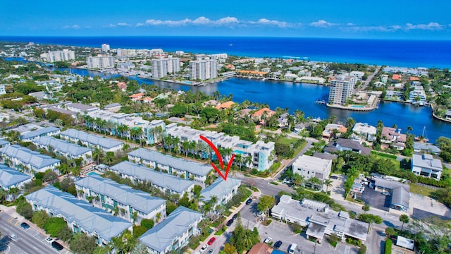 drone / aerial view featuring a water view