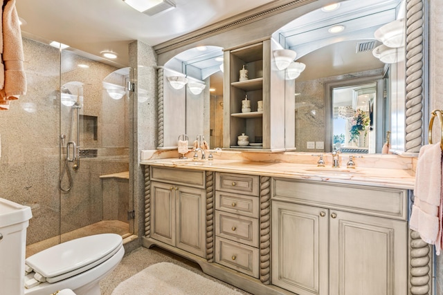 bathroom with vanity, toilet, and walk in shower