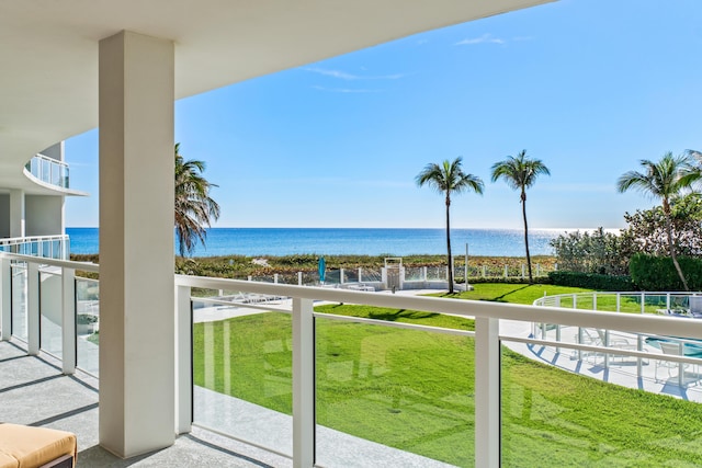 balcony featuring a water view