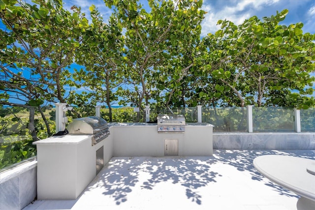 view of patio with grilling area and exterior kitchen