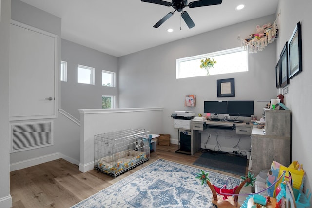 6450 SW 77th St, Gainesville, FL 32608 - home office with hardwood / wood-style floors