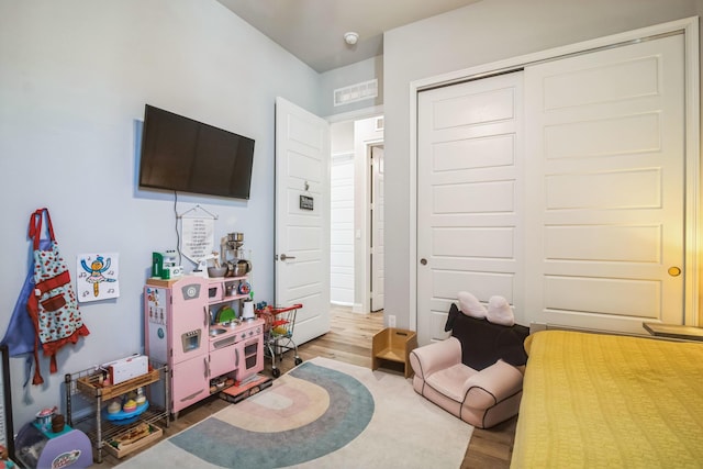 6450 SW 77th St, Gainesville, FL 32608 - game room featuring hardwood / wood-style floors