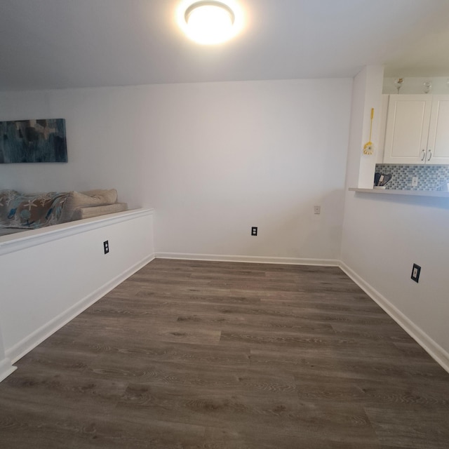 interior space with dark hardwood / wood-style flooring