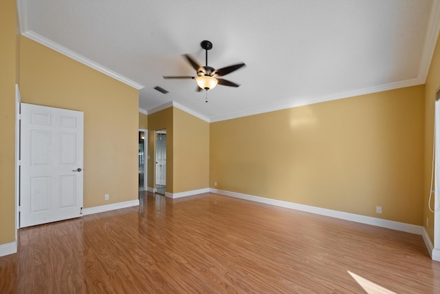 unfurnished room with ornamental molding, light hardwood / wood-style floors, and ceiling fan