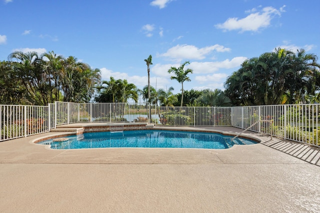 view of pool featuring a patio area