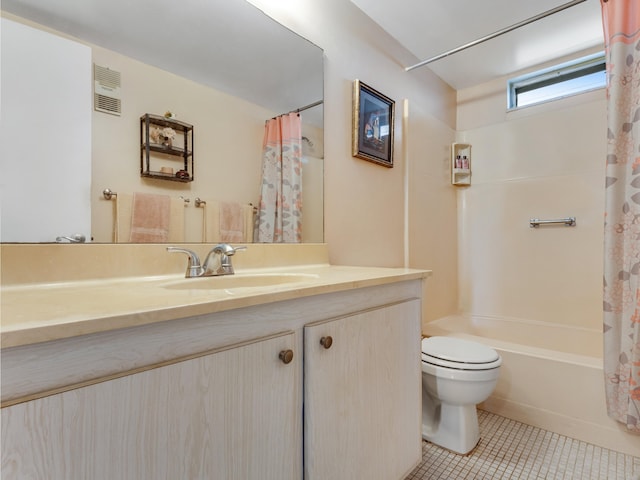 full bathroom featuring shower / tub combo with curtain, tile patterned floors, toilet, and vanity