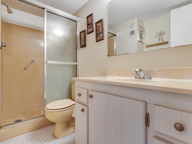 bathroom with walk in shower, tile patterned floors, toilet, and vanity