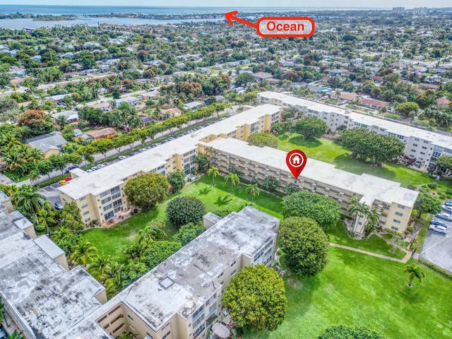 birds eye view of property featuring a water view