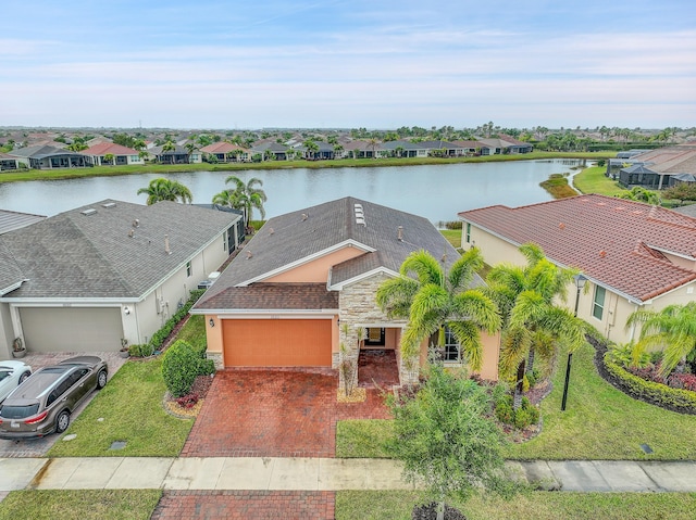 drone / aerial view with a water view