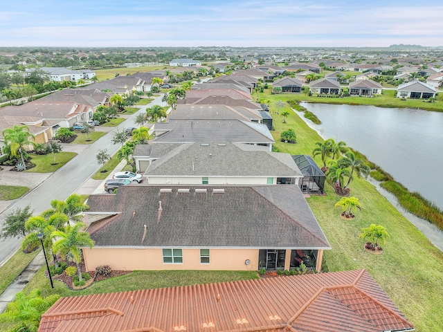 drone / aerial view featuring a water view