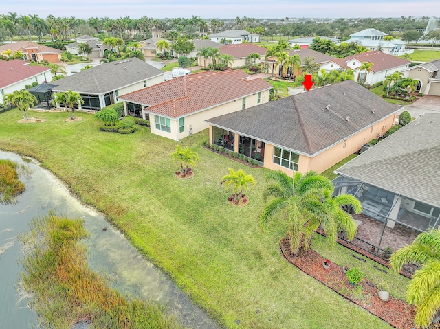 drone / aerial view featuring a water view