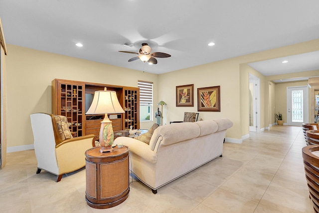 living room featuring ceiling fan