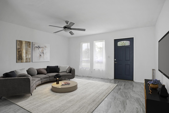 living room with ceiling fan