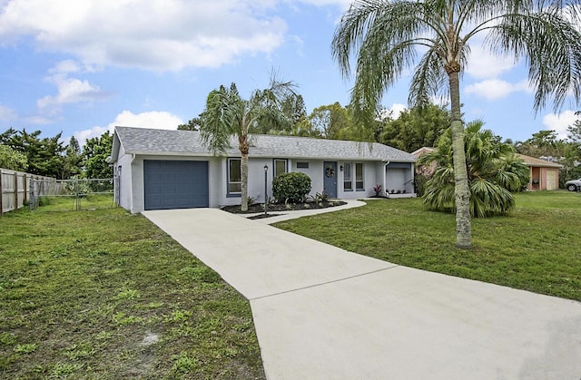 single story home with a garage and a front lawn