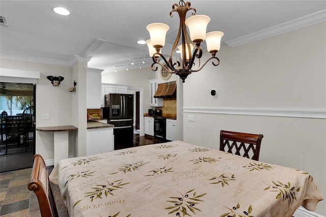 dining area featuring ornamental molding