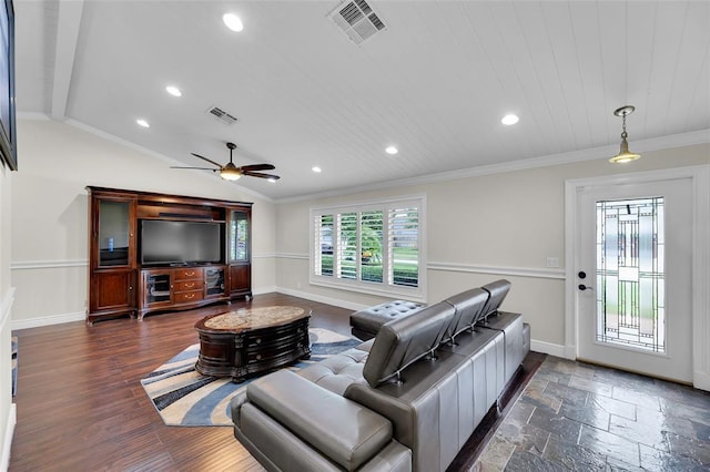 living room featuring vaulted ceiling, ceiling fan, and ornamental molding