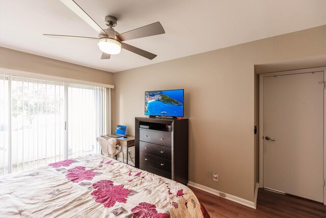 bedroom featuring light wood-type flooring, ceiling fan, and ensuite bath