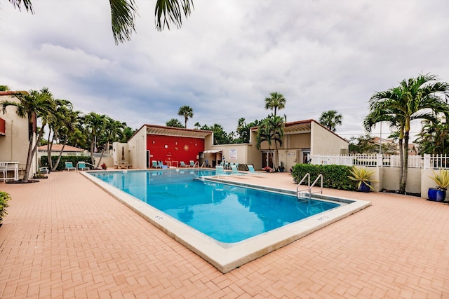 view of pool featuring a patio area