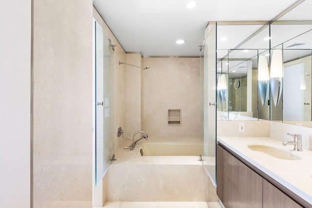 bathroom featuring vanity and separate shower and tub