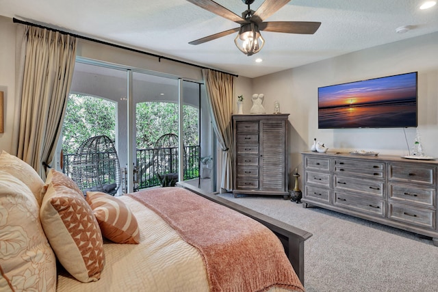 carpeted bedroom featuring ceiling fan, access to outside, and a textured ceiling