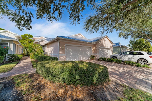 ranch-style home with a garage