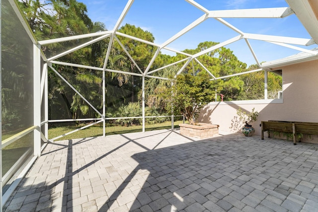 view of patio / terrace with a lanai