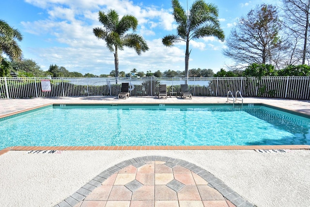 view of pool featuring a patio