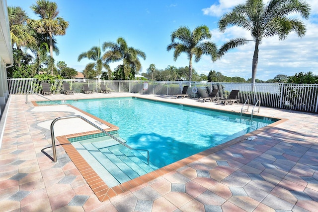 view of swimming pool featuring a patio