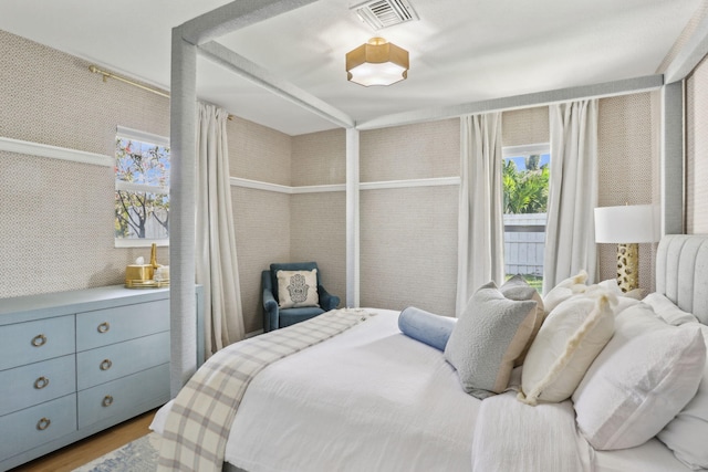 bedroom featuring hardwood / wood-style flooring